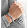 Strieborný náramok so syntetickým opálom a kryštálmi Preciosa modrý 33105.1