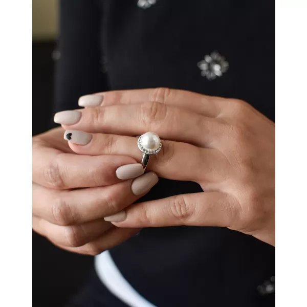 Strieborný prsteň s kryštálmi Swarovski a bielou perlou 35021.1