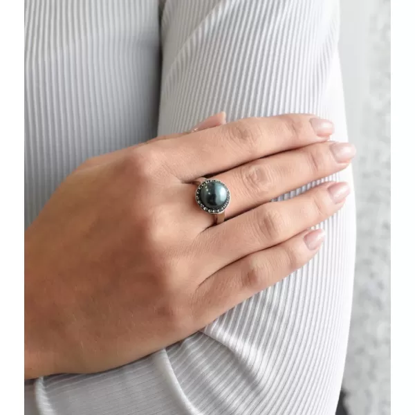 Strieborný prsteň s kryštálmi a zelenou perlou 35021.3 tahiti