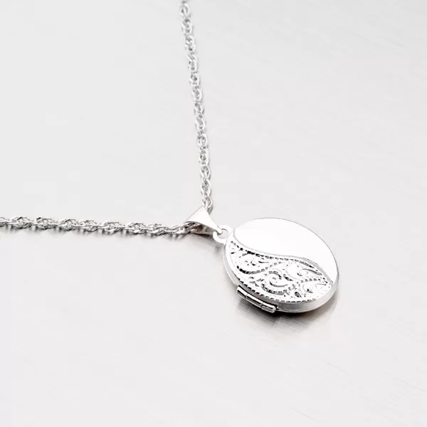 Medailón z bieleho zlata s gravírovaním 197-0302