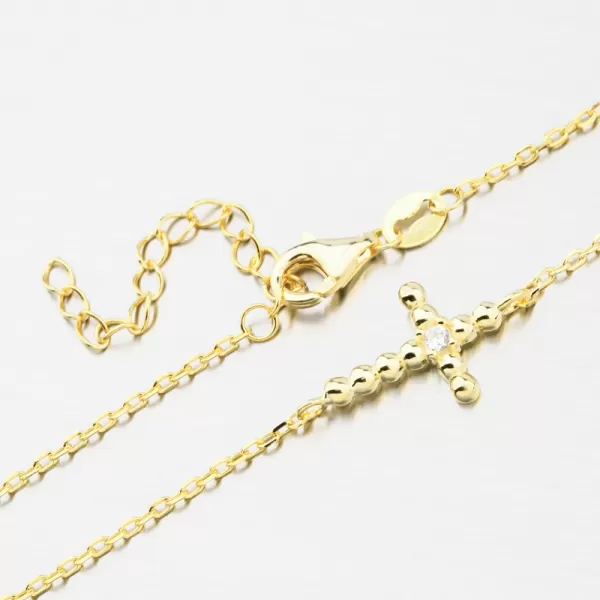 Pozlátený strieborný náramok kríž so zirkónmi BST-14580