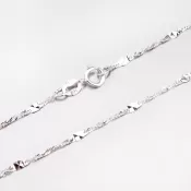 Zlatá retiazka zdobená gravírovanými plieškami 45-1703