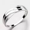 Krásny symetrický prsteň z bieleho zlata DZ1562-B