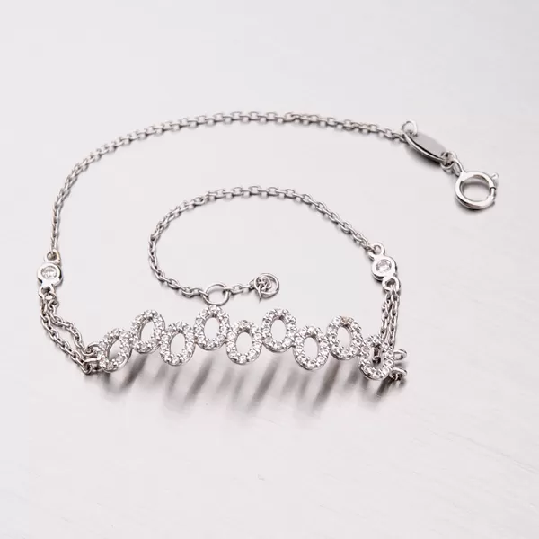 Zlatý náramok so zirkónmi 149-0657