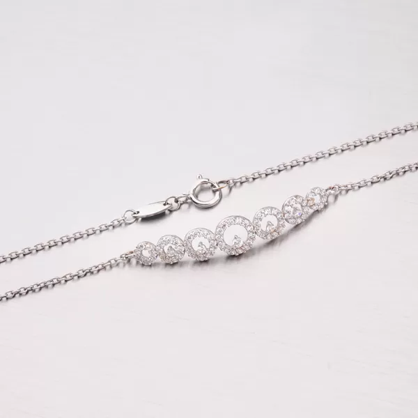 Zlatý náramok so zirkónmi 149-0659