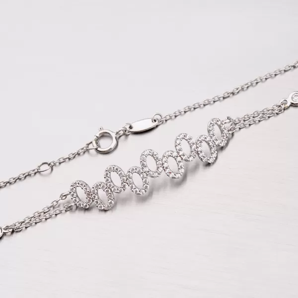 Zlatý náramok so zirkónmi 149-0657