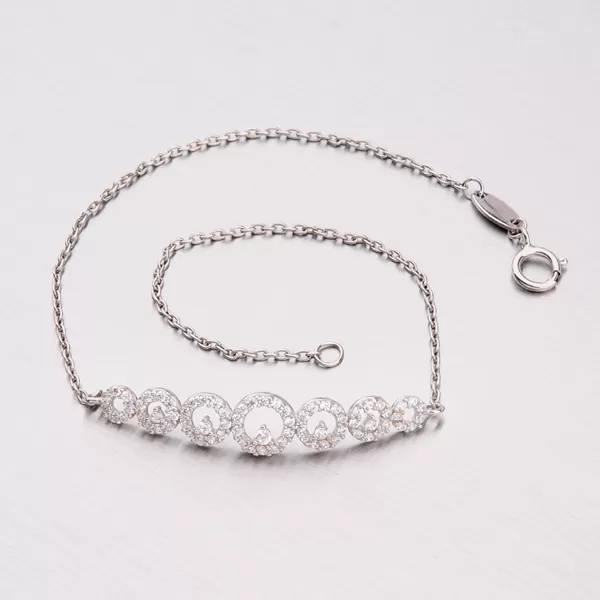 Zlatý náramok so zirkónmi 149-0659