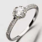 Prsteň so zirkónmi RXX02130077