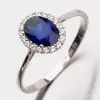 Prsteň so zafírom a zirkónmi 11-207