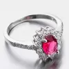 Strieborný prsteň s rubínom a zirkónmi GST-11266