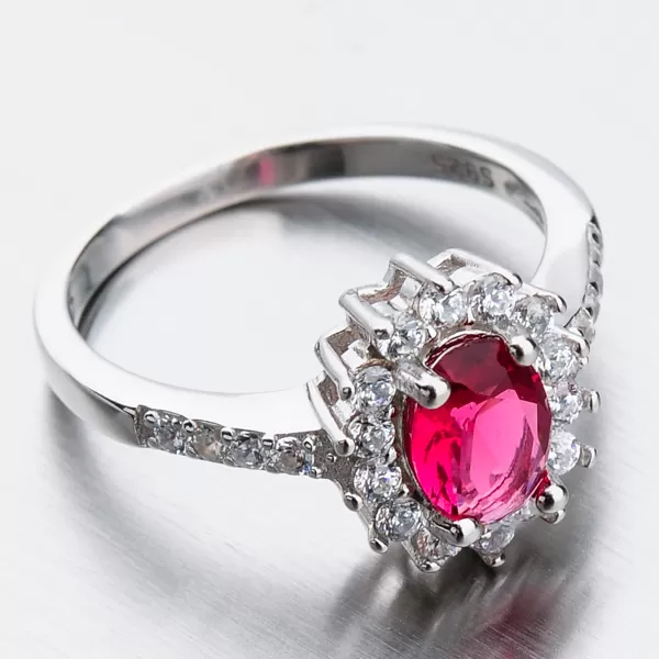 Strieborný prsteň s rubínom a zirkónmi GST-11266
