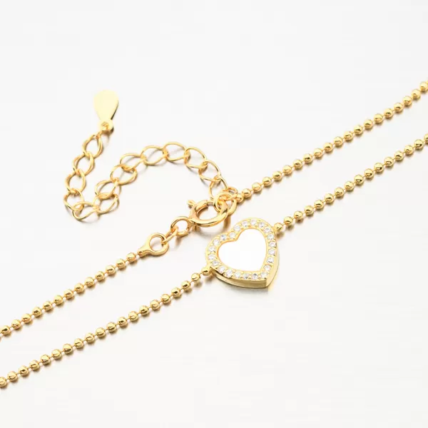 Pozlátený strieborný guličkový náramok so srdiečkom BST-14662/G