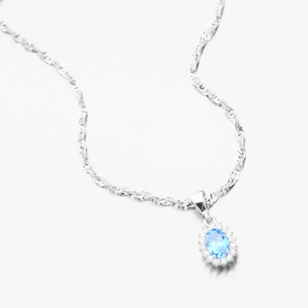 Dámsky prívesok zirkón akvamarín a biele zlato 13-406