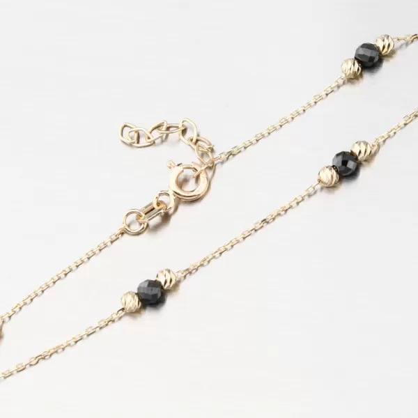 Zlatý náramok s čiernymi zirkónmi a zlatými guličkami GCA14-007