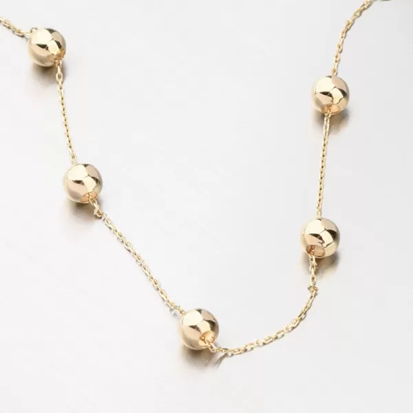 Zlatý náramok s loptičkami GCA14-008