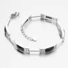 Strieborný náramok s čiernymi zirkónmi PKL-4044