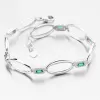 Strieborný náramok s smaragdmi a zirkónmi PKL-4043
