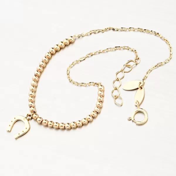 Zlatý náramok s guličkami a podkovou 144P-141240
