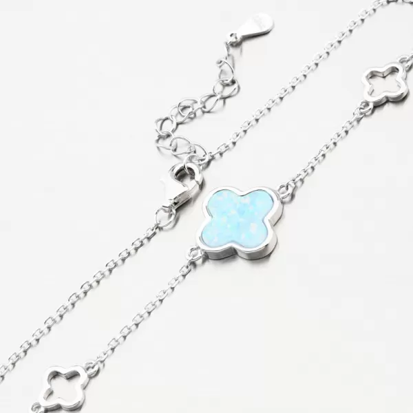 Strieborný dámsky náramok so štvorlístkami a modrým opálom PKL-4017