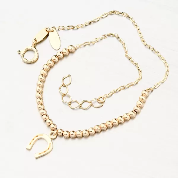 Zlatý náramok s guličkami a podkovou 144P-141240