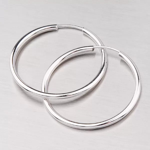 Kruhy z bieleho zlata 25 mm 12-055